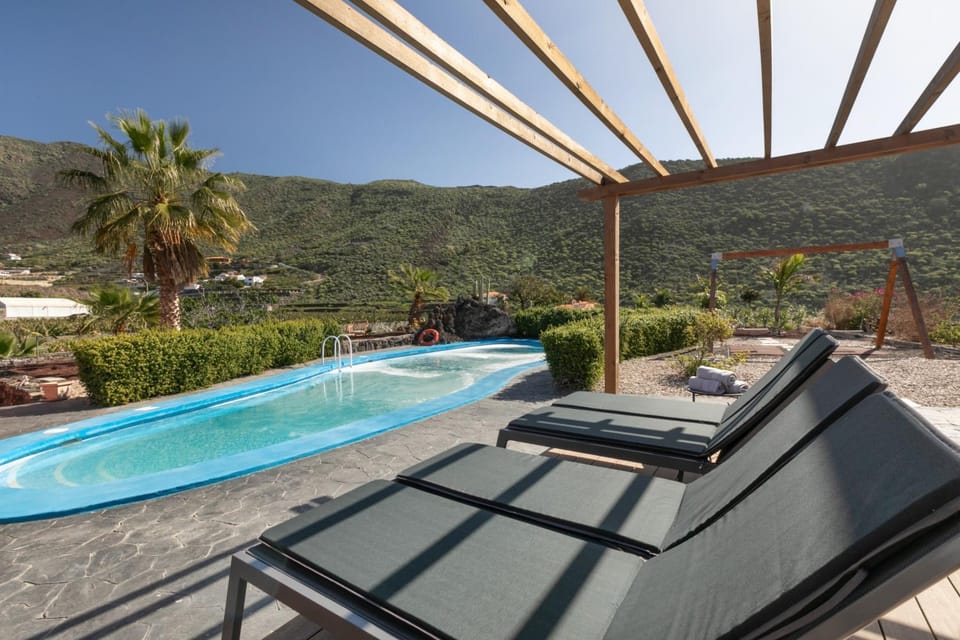 Property building, Living room, Swimming pool
