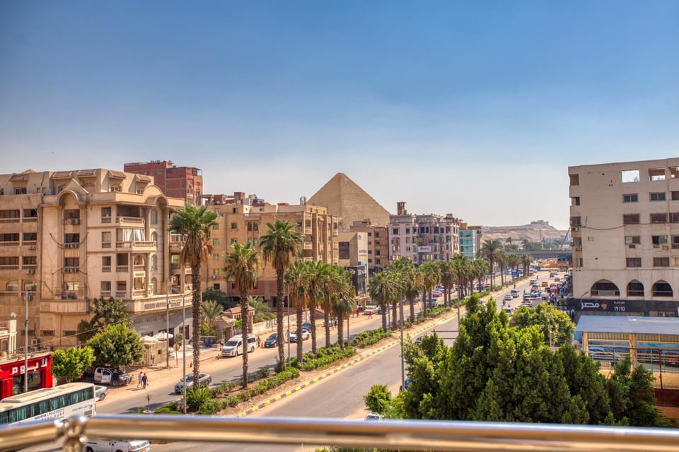 Property building, Day, Neighbourhood, Natural landscape, Bird's eye view, City view, Street view, Location, Parking