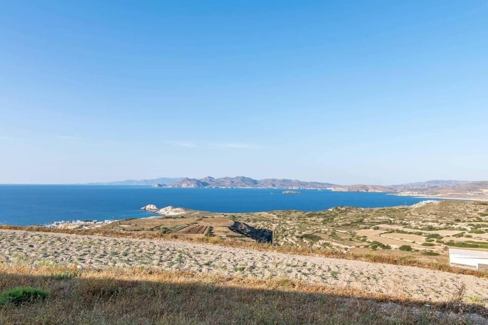 Dust in The Wind Sunrise House in Milos
