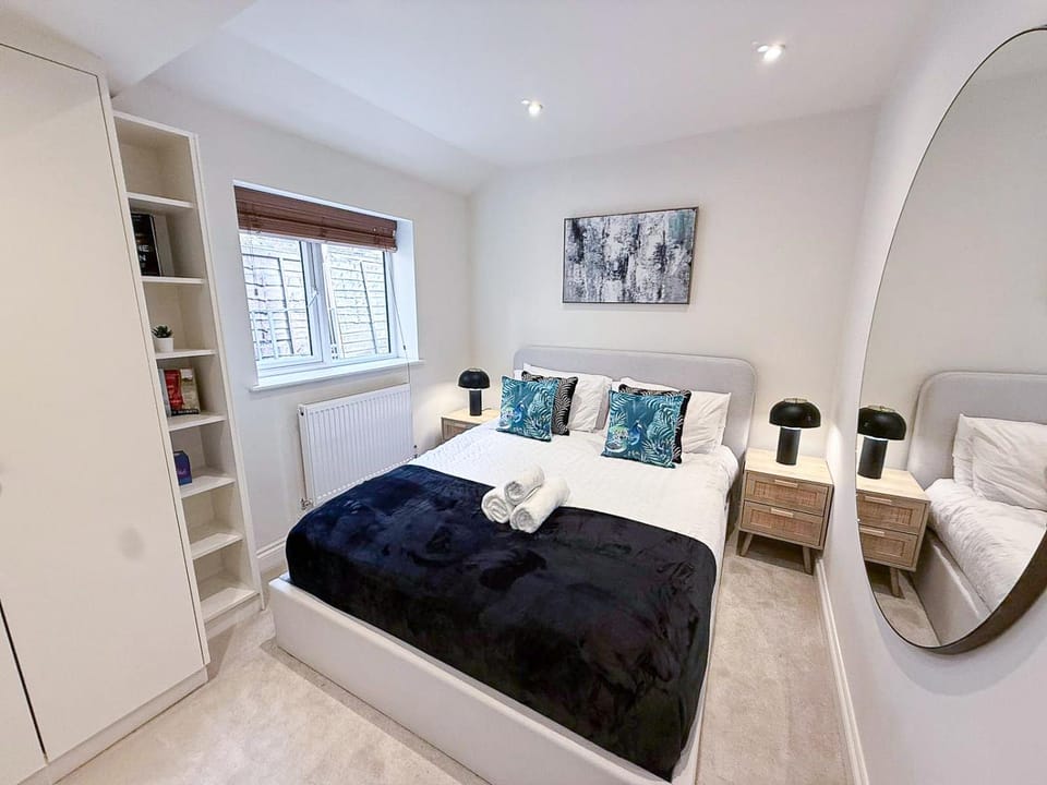 Bed, Photo of the whole room, Decorative detail, Bedroom, flat iron, hair dryier, heating, storage, towels, wardrobe