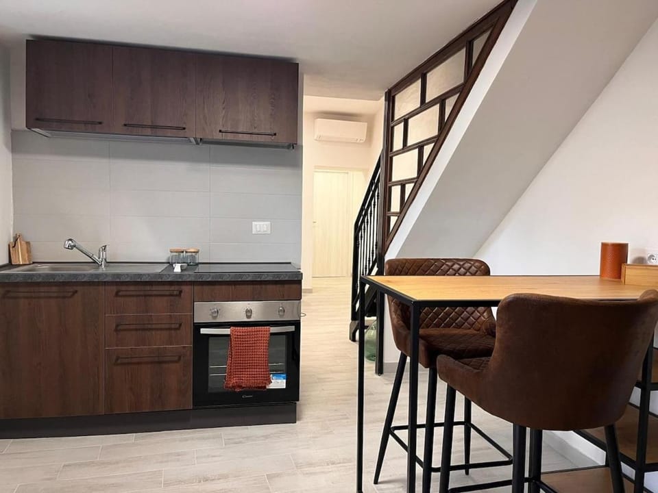 Kitchen or kitchenette, stove
