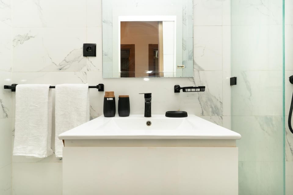 Bathroom, bidet, towels