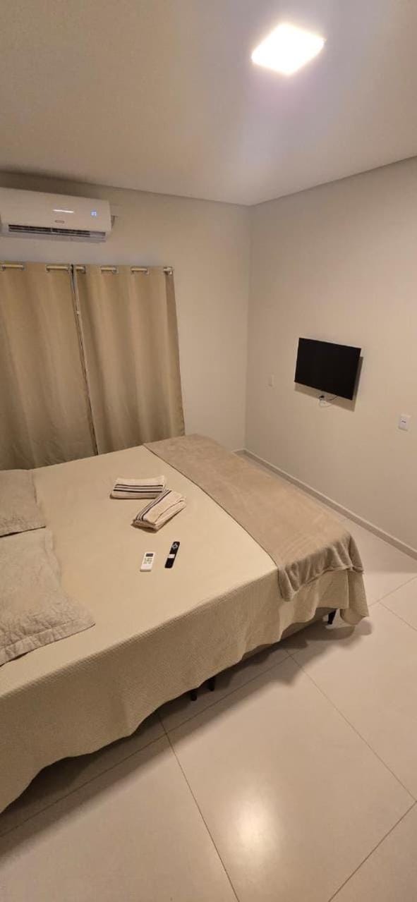 Bed, Photo of the whole room, Bedroom, towels, air conditioner