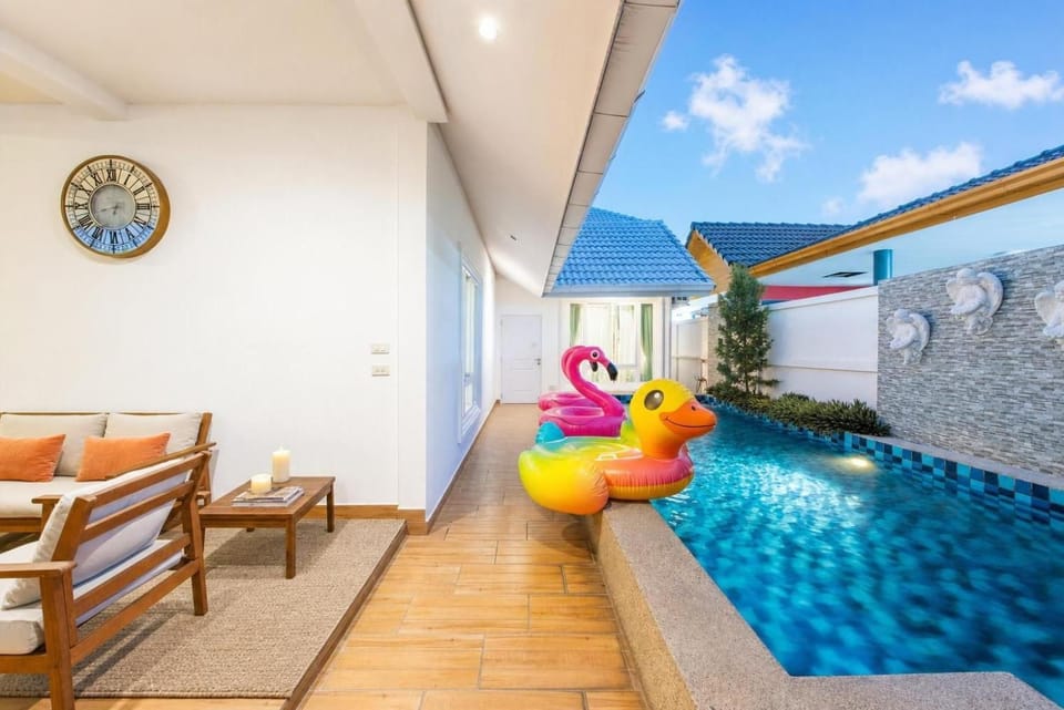 Patio, Day, Seating area, Pool view, Swimming pool, sunbed