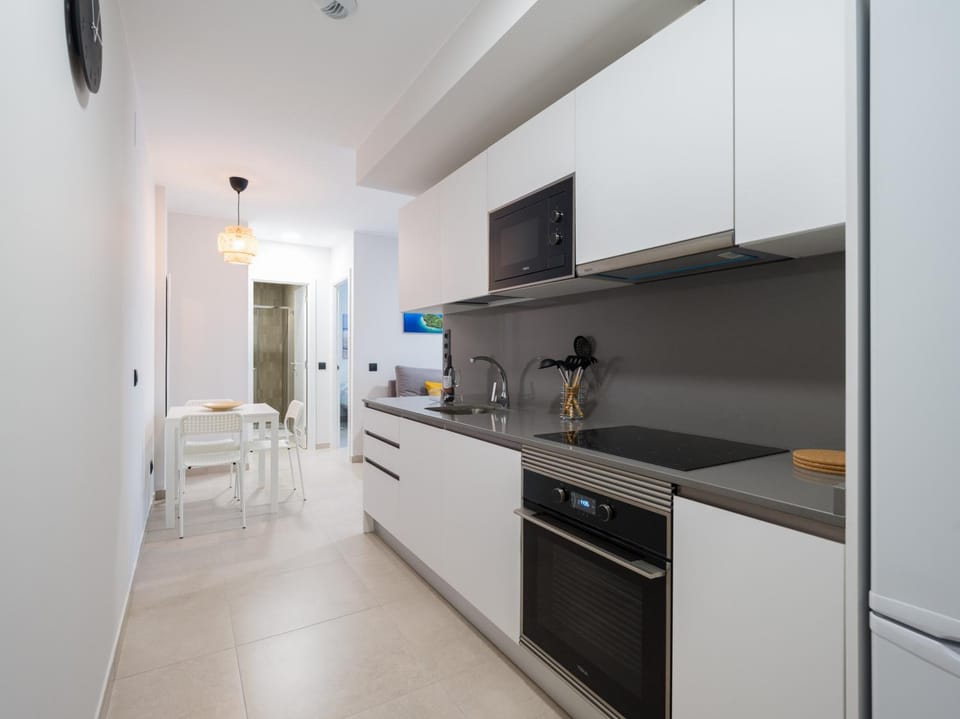 Kitchen or kitchenette, oven