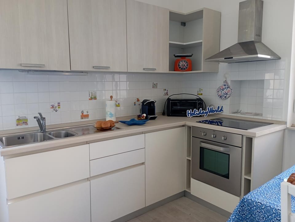Kitchen or kitchenette, oven