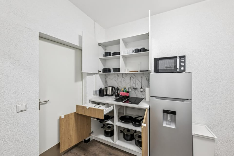 Kitchen or kitchenette, oven, stove, toaster