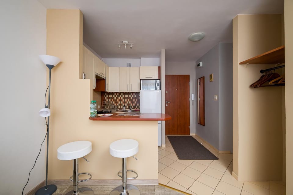 Kitchen or kitchenette, microwave, oven, stove
