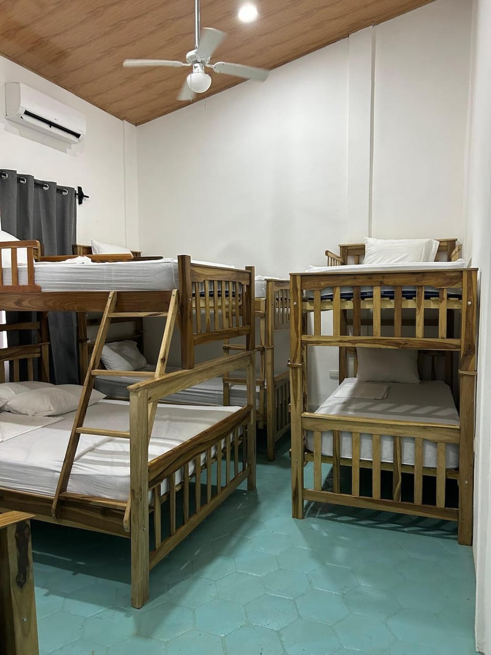 Photo of the whole room, bunk bed, air conditioner