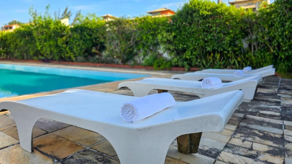 Swimming pool, sunbed