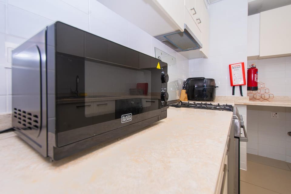 Kitchen or kitchenette, microwave