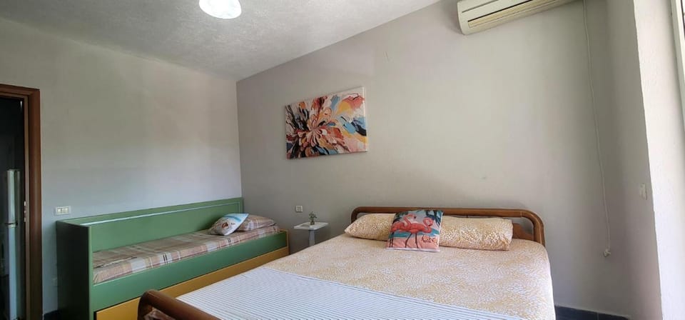 Bed, Photo of the whole room, Bedroom, towels, air conditioner