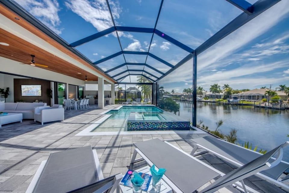CoralVilla Twenty Two - modern, pool & spa, water view, boating, TV House in Cape Coral
