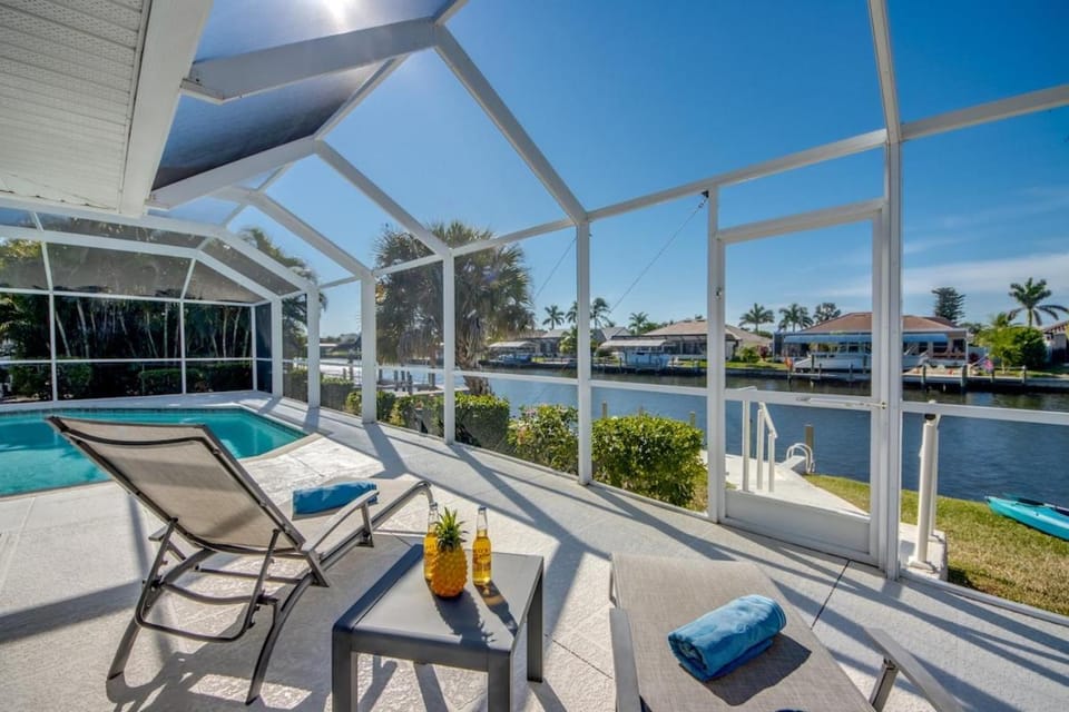 CoralVilla Sunset Avenue-modern, pool table, spa, pool, boating, water view House in Cape Coral