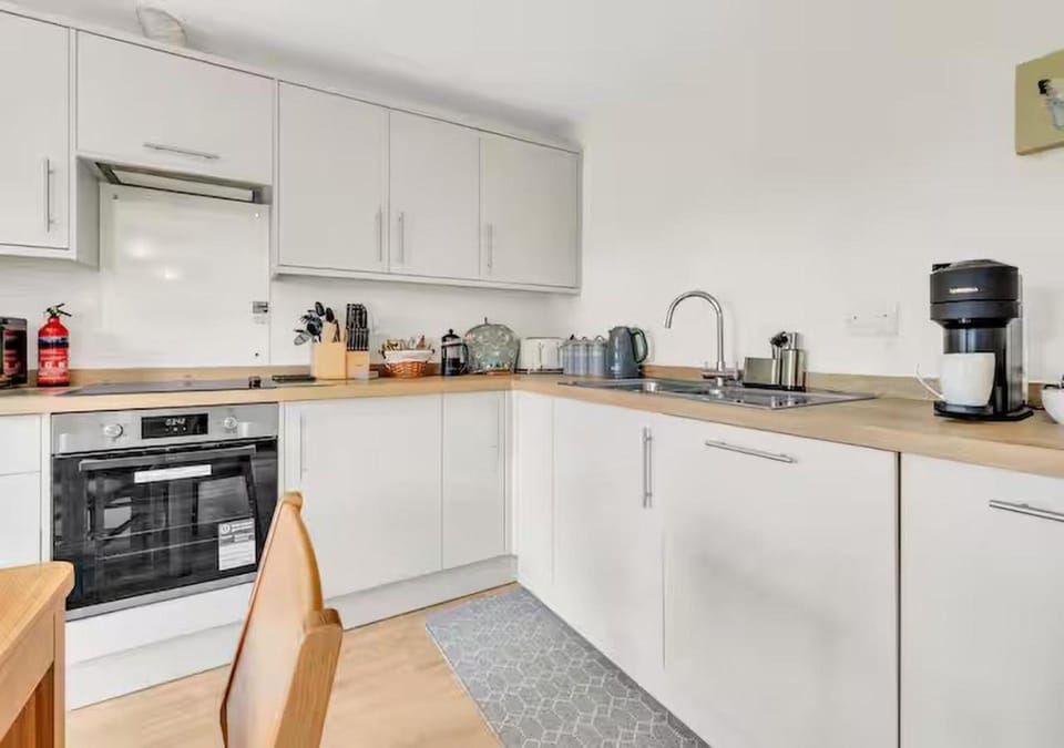 Kitchen or kitchenette, oven, stove, toaster