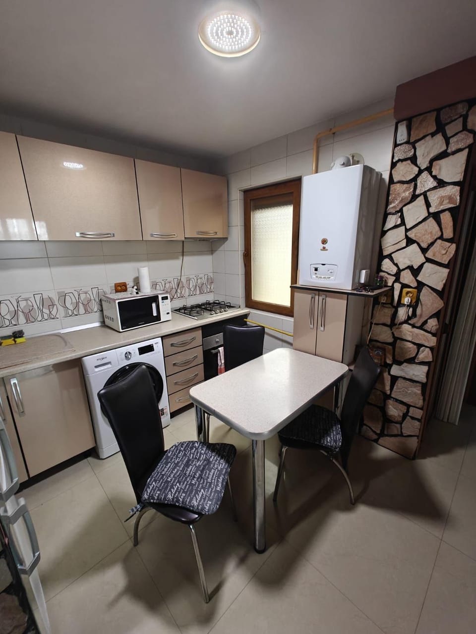 Kitchen or kitchenette, microwave