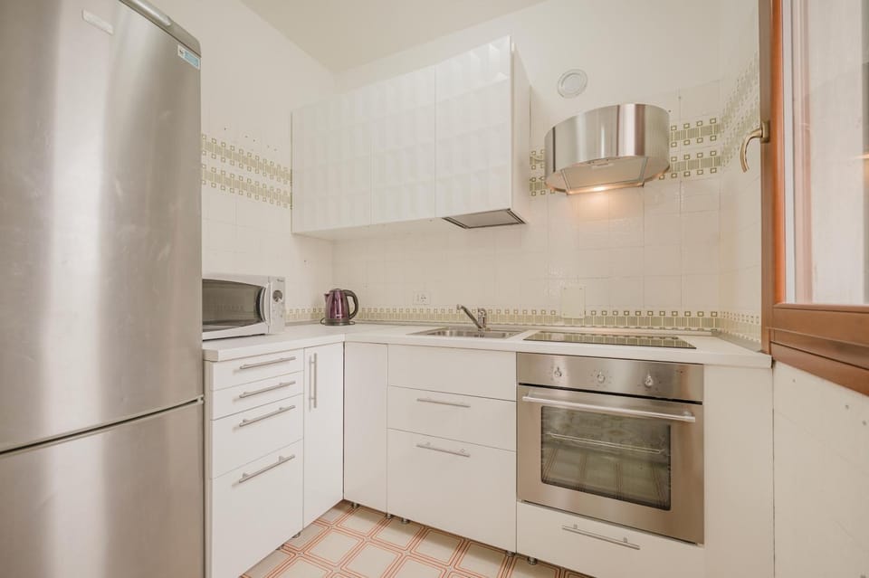 Kitchen or kitchenette, oven, stove