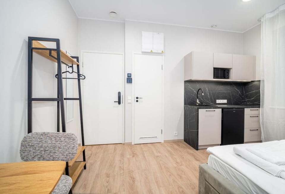 Bed, Seating area, Dining area, wardrobe, kitchen