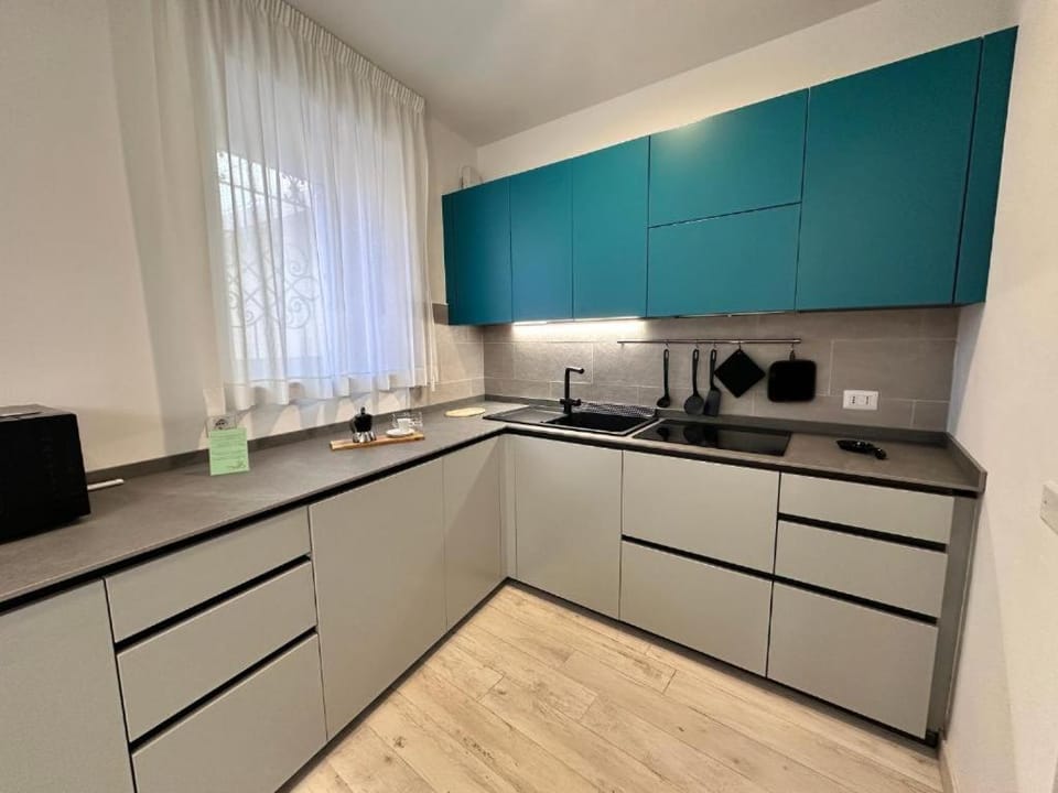 Kitchen or kitchenette, dishwasher, microwave, stove, kitchen