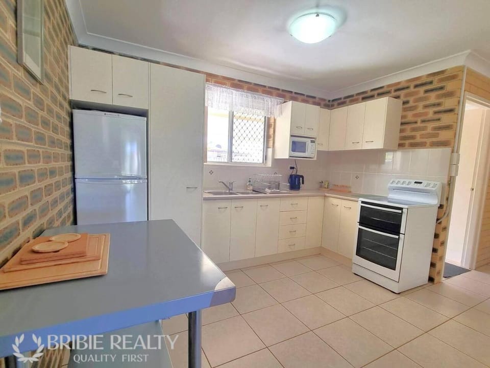 Kitchen or kitchenette, oven