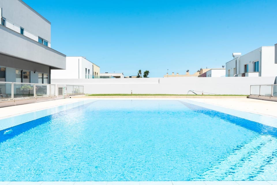 Property building, Pool view, Swimming pool, sunbed