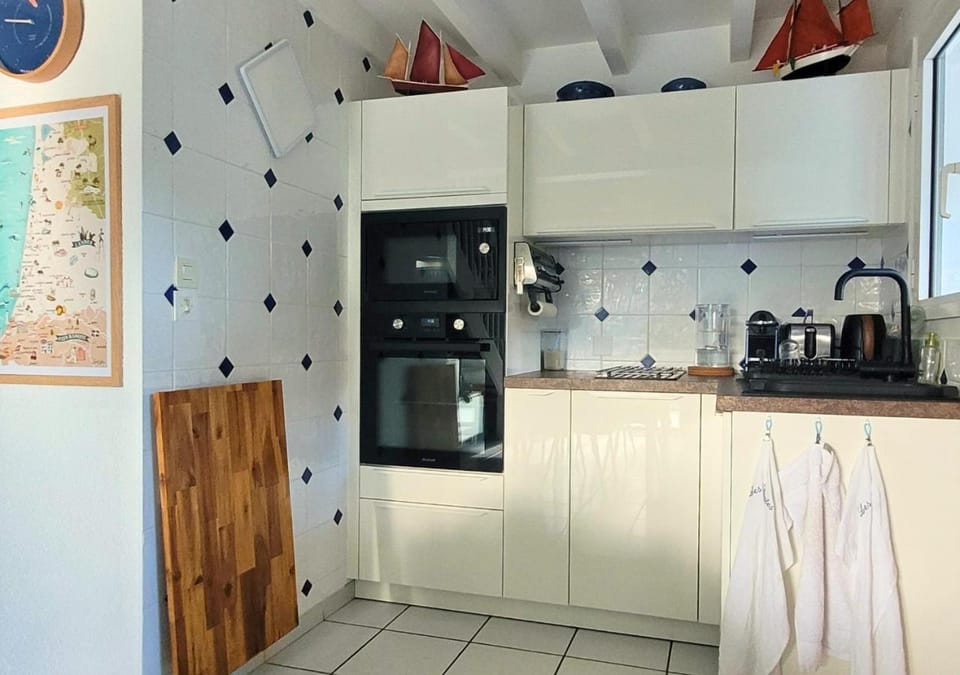 Kitchen or kitchenette, oven, stove, toaster