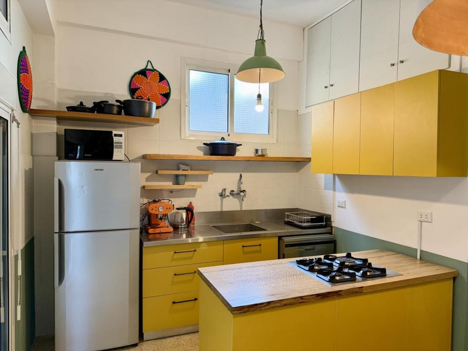 Kitchen or kitchenette, microwave, oven, stove