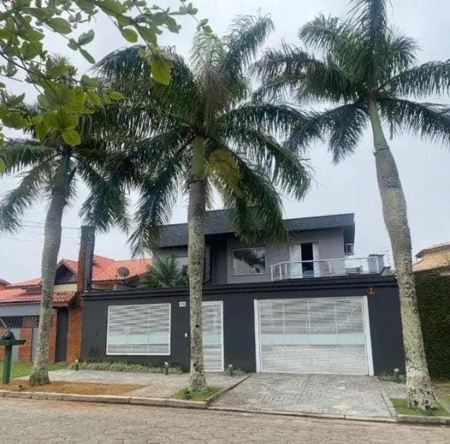 Casa de temporada com piscina House in Peruíbe