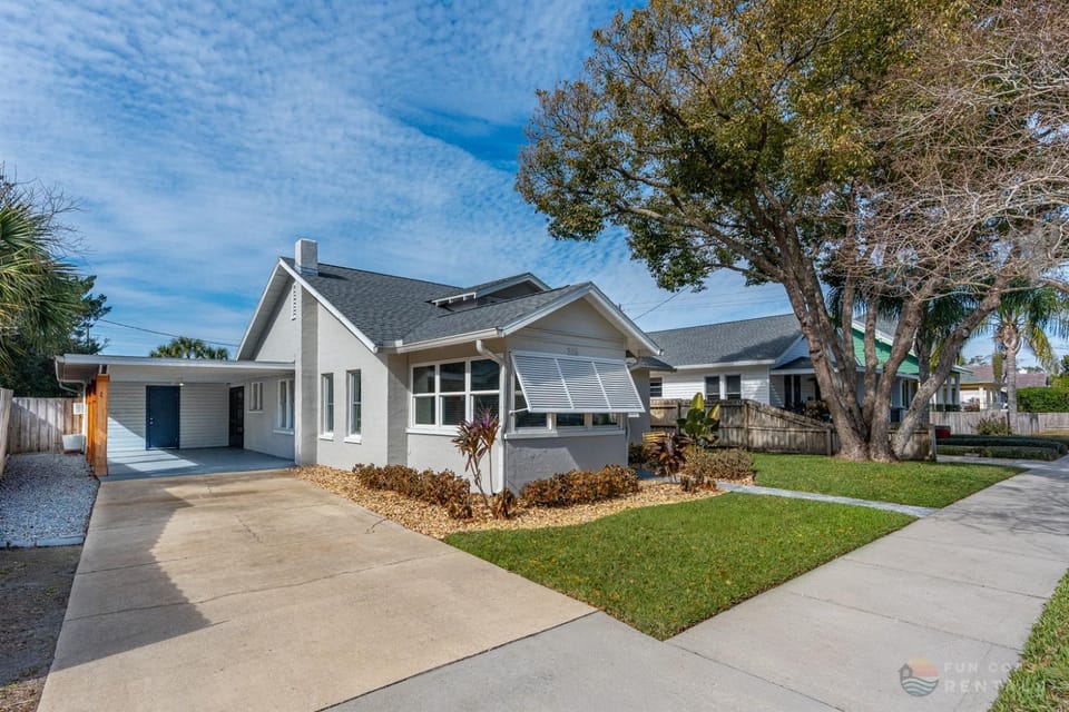 Dog Friendly Home with Fenced Yard, Office, STEPS to Canal St & Advent Health! House in New Smyrna Beach