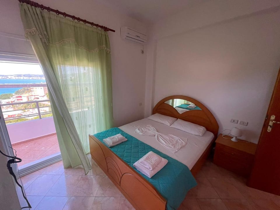 Bed, Photo of the whole room, Bedroom, towels, air conditioner