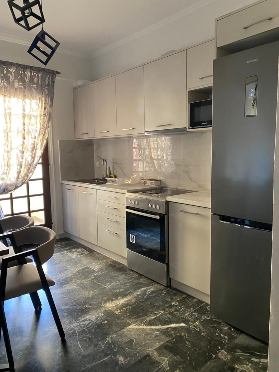 Kitchen or kitchenette, oven, stove