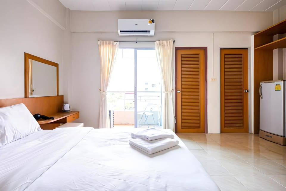 Bed, Photo of the whole room, Bedroom, towels, air conditioner