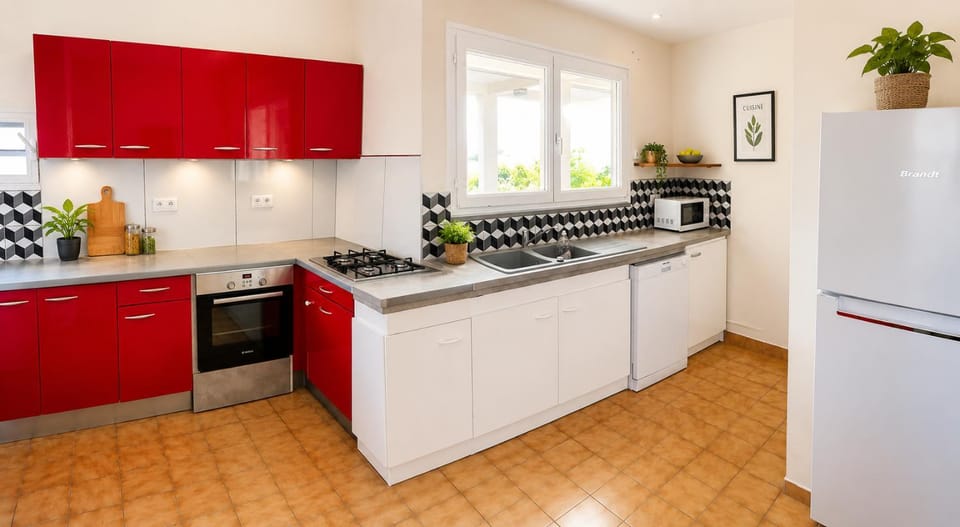 Kitchen or kitchenette, dishwasher, oven, stove, toaster