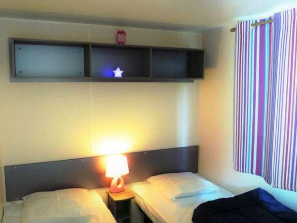 Mobil-home 4 pers, 2 ch, jardin et barbecue - API-1-52-1349 Campground/ 
RV Resort in Auvergne-Rhône-Alpes