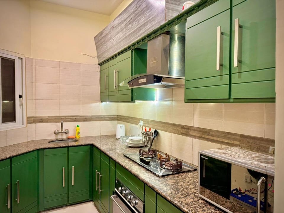 Kitchen or kitchenette, stove