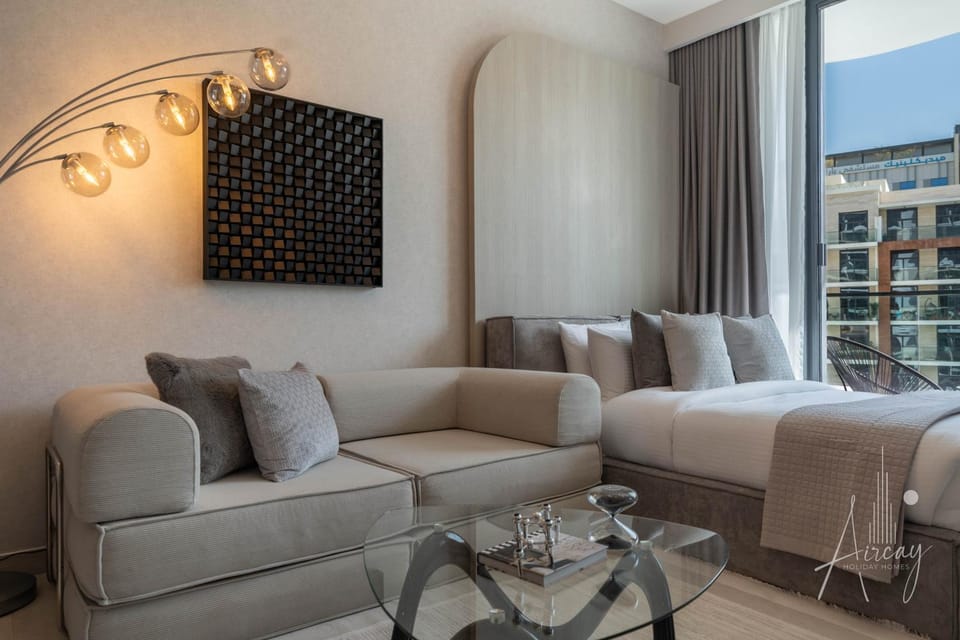 Sunlit Luxe Studio Serene Skies Infinity Pool Apartment in Dubai