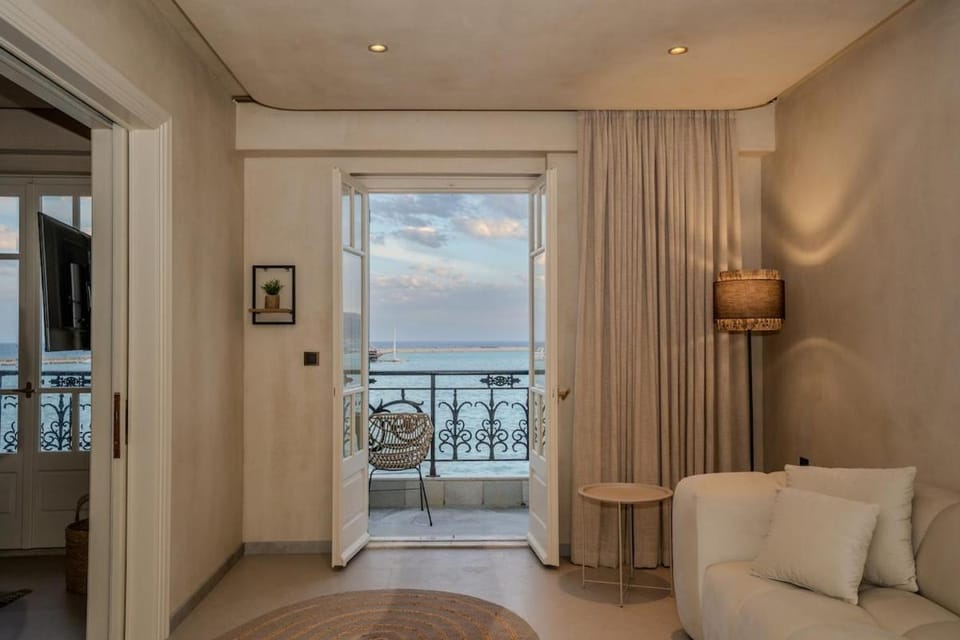 View (from property/room), Balcony/Terrace, Living room, Photo of the whole room, Seating area, Sea view