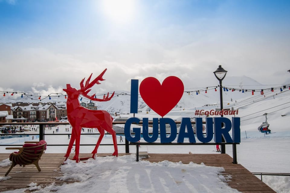 Nearby landmark, Day, People, Natural landscape, Winter, Evening entertainment, Text overlay, Street view, group of guests