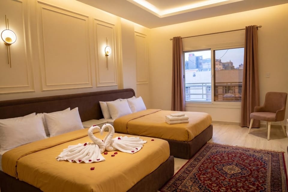 Property building, Bed, View (from property/room), Photo of the whole room, Bedroom, towels, air conditioner