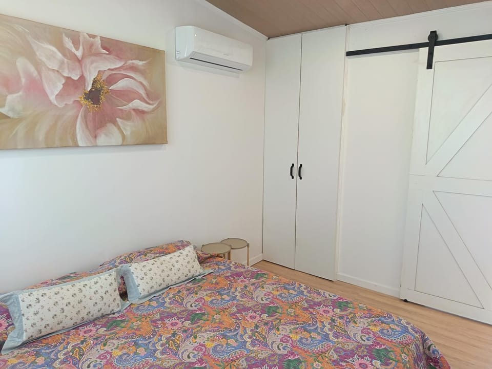 Bed, wardrobe, air conditioner
