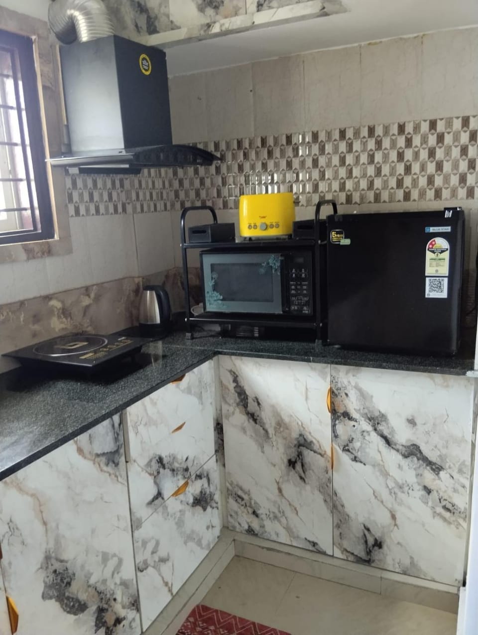 Kitchen or kitchenette, oven, stove, toaster