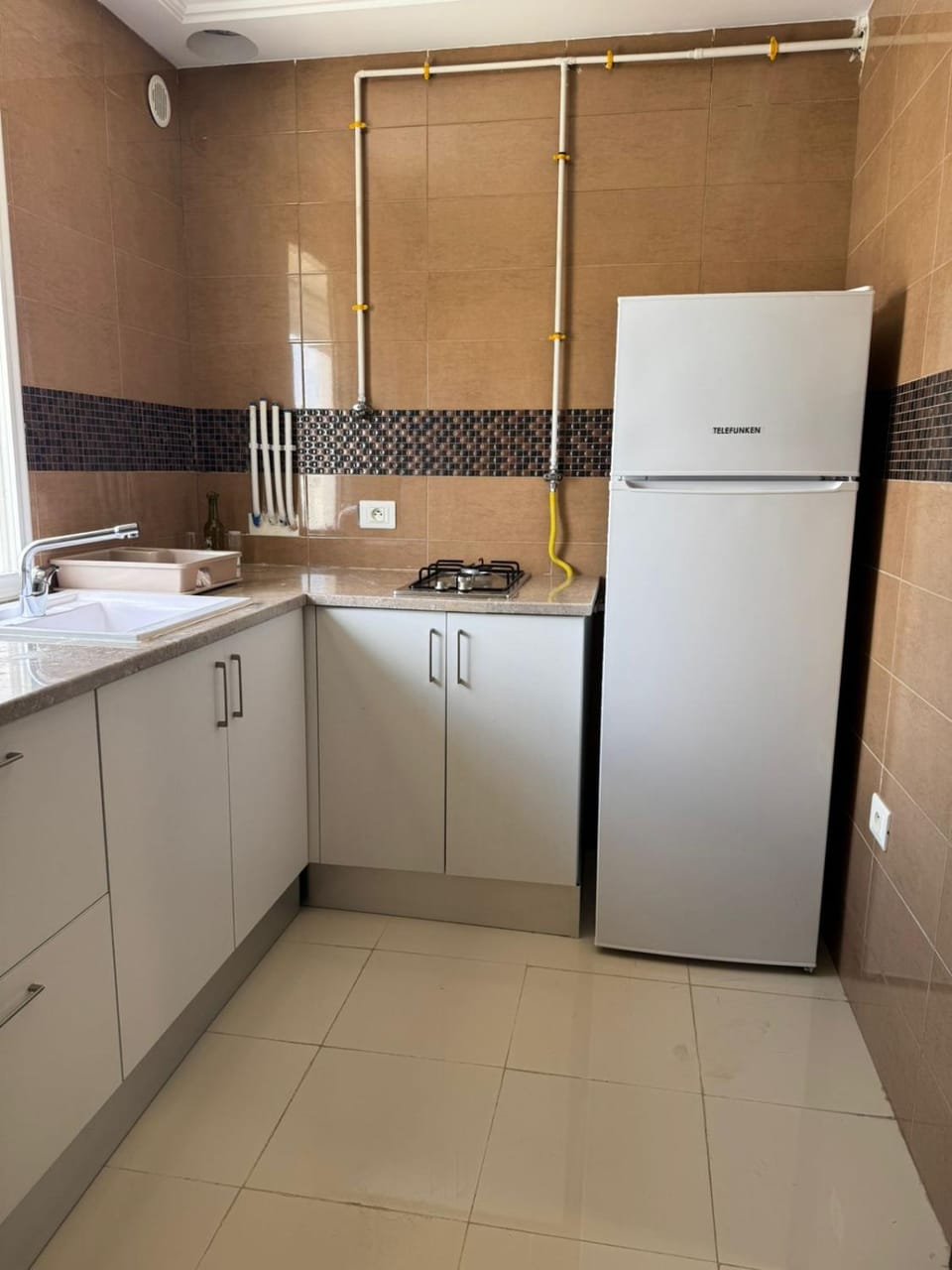 Kitchen or kitchenette, stove