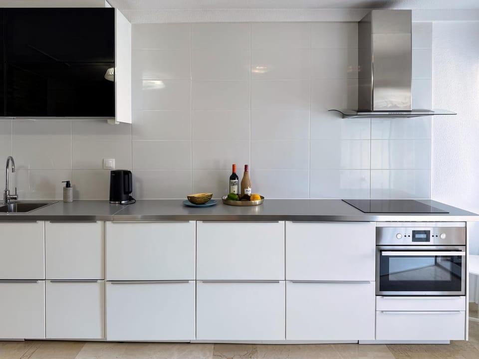 Kitchen or kitchenette, oven, stove