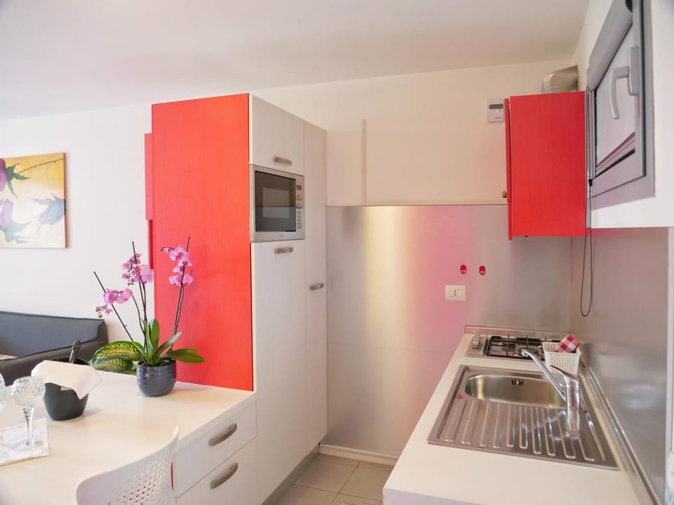 Kitchen or kitchenette, stove