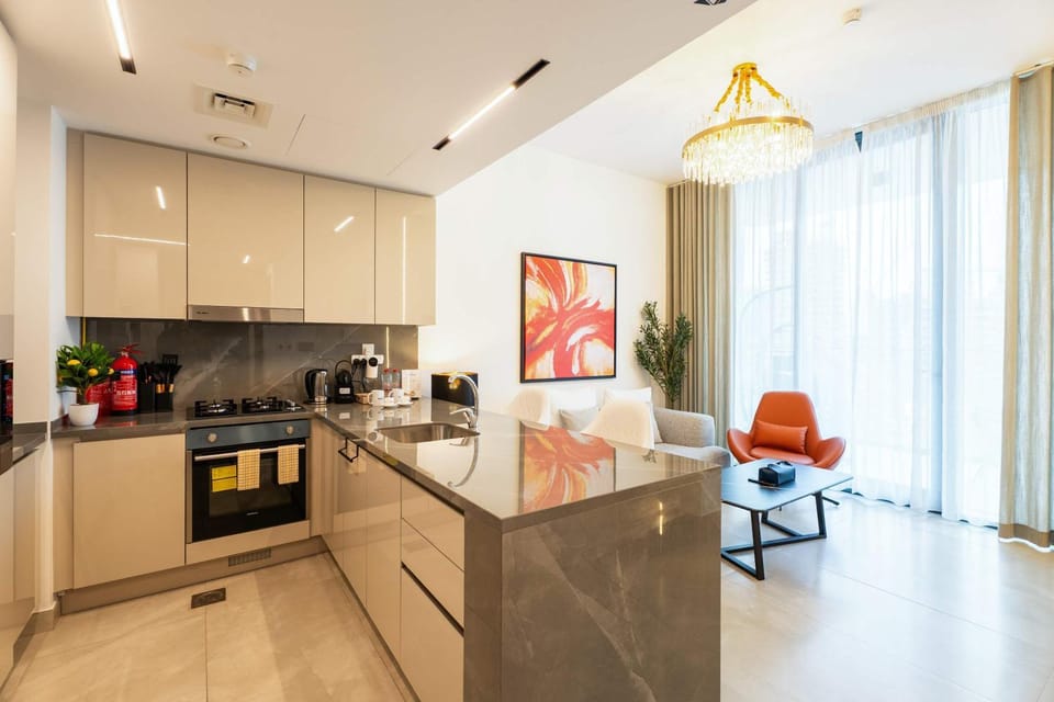 Rentico l Luxury 1BR with Burj Khalifa & Canal View Apartment in Dubai