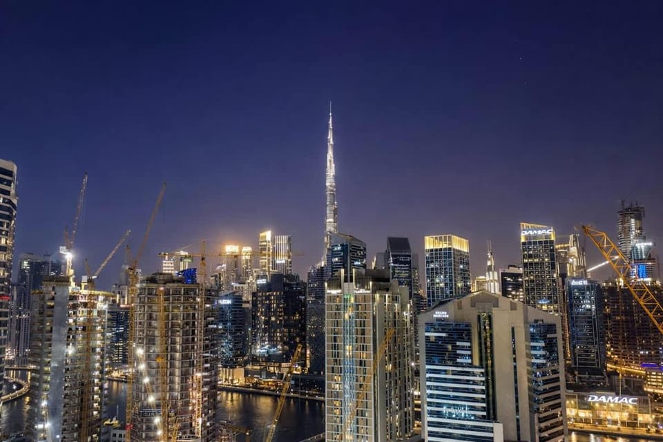 Rentico l Luxury 1BR with Burj Khalifa & Canal View Apartment in Dubai