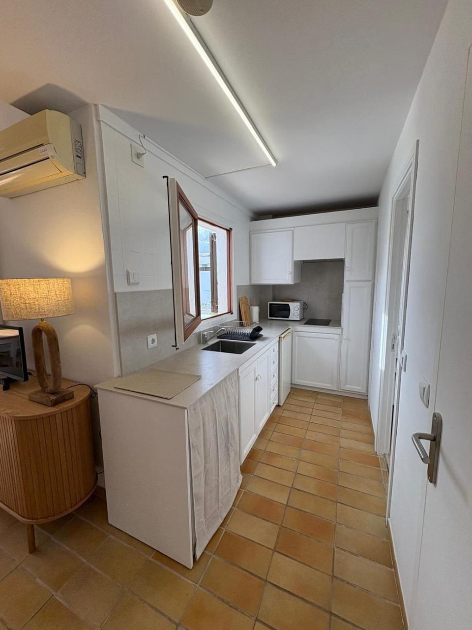 Kitchen or kitchenette, stove
