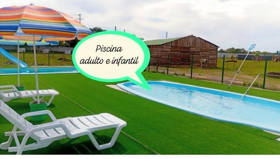 Swimming pool, sunbed