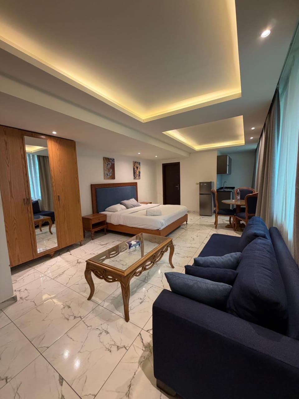 Bed, Seating area, Bedroom