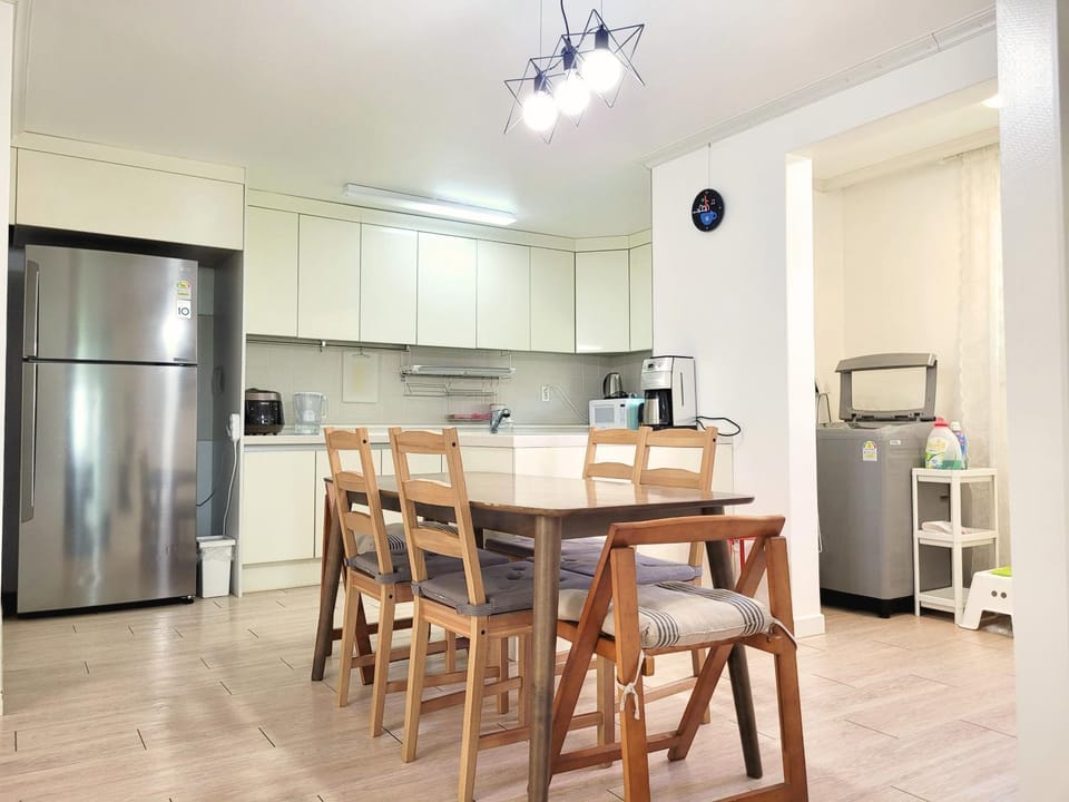 Dining area, microwave, oven, toaster, washing machine